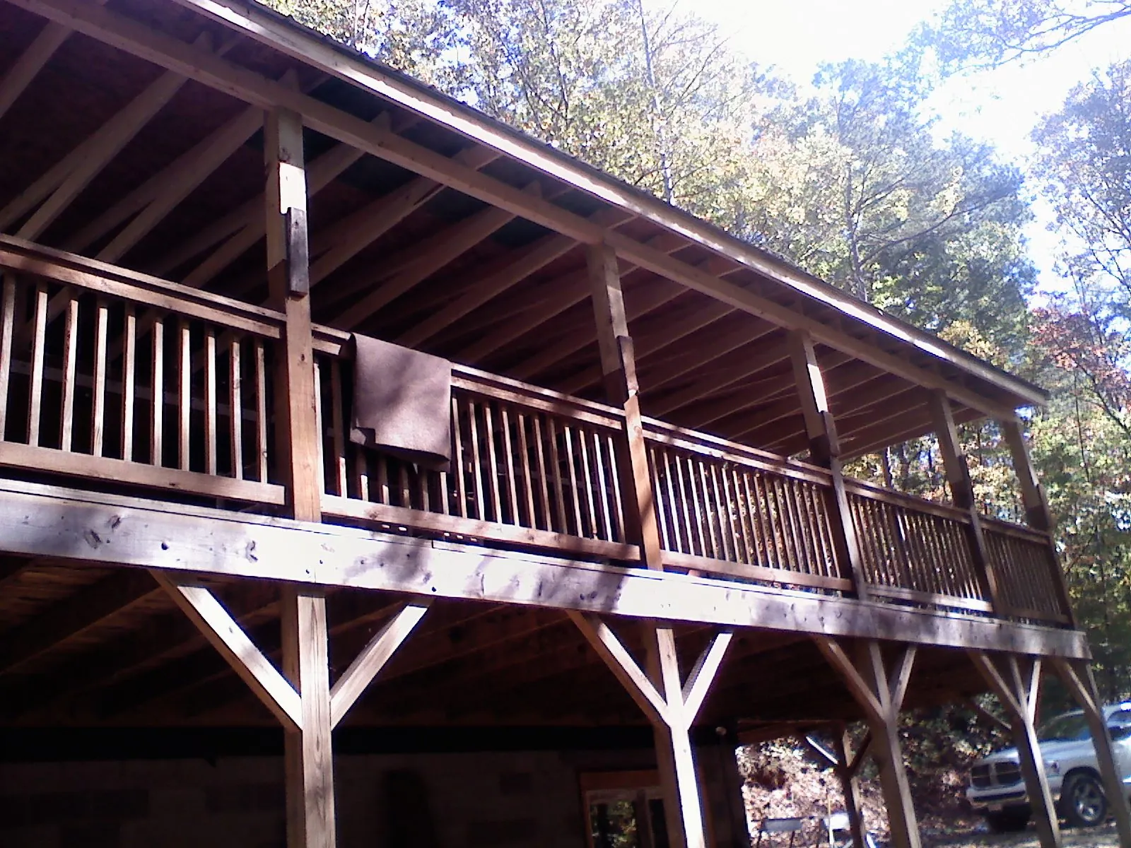 Timber framing under a new elevated porch and deck — Roof Leak Repair in Tillman by Roofing Brothers